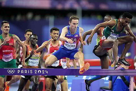 Kenneth Rooks clears an obstacle during the men's 3000 meters steeplechase final